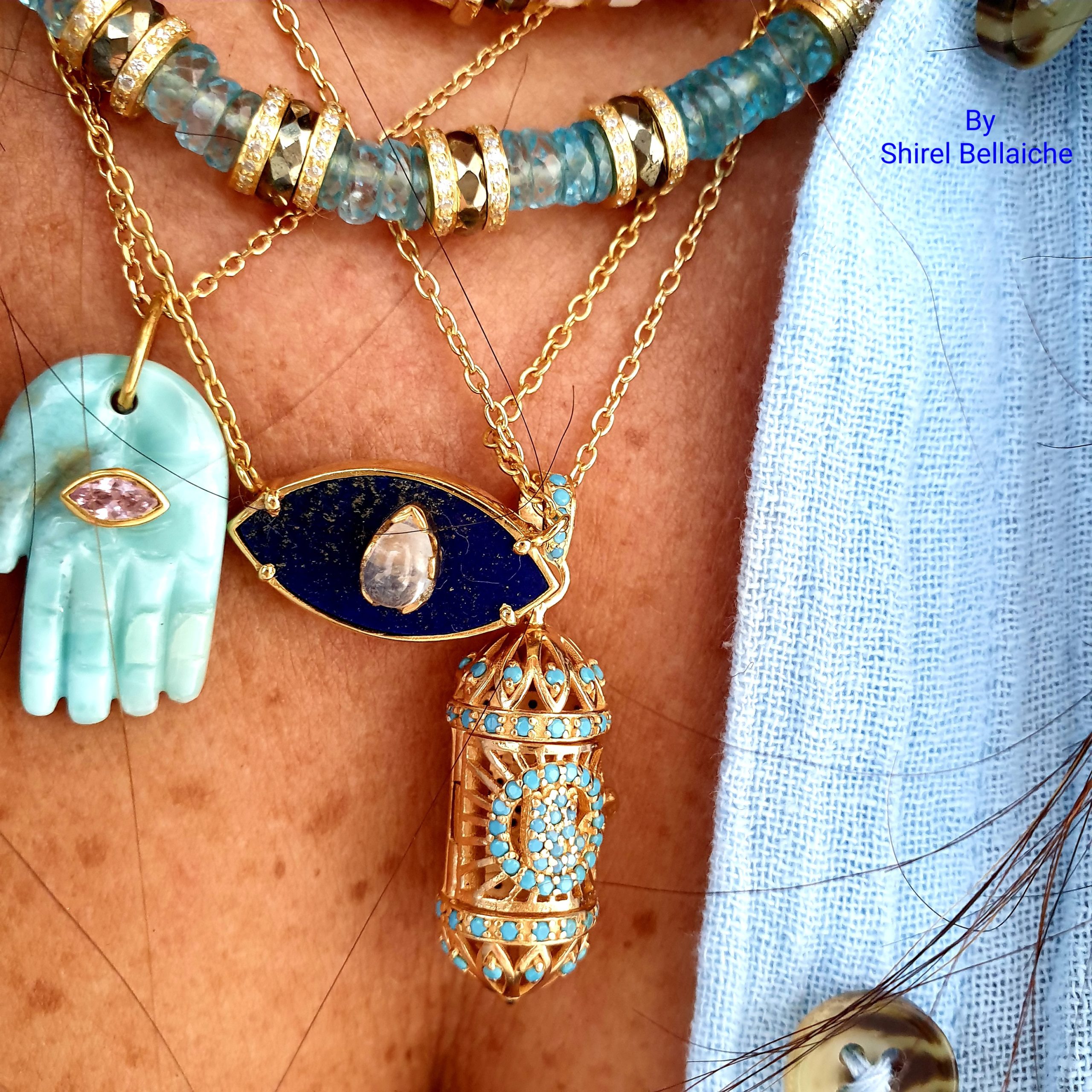 turquoise sefer hand